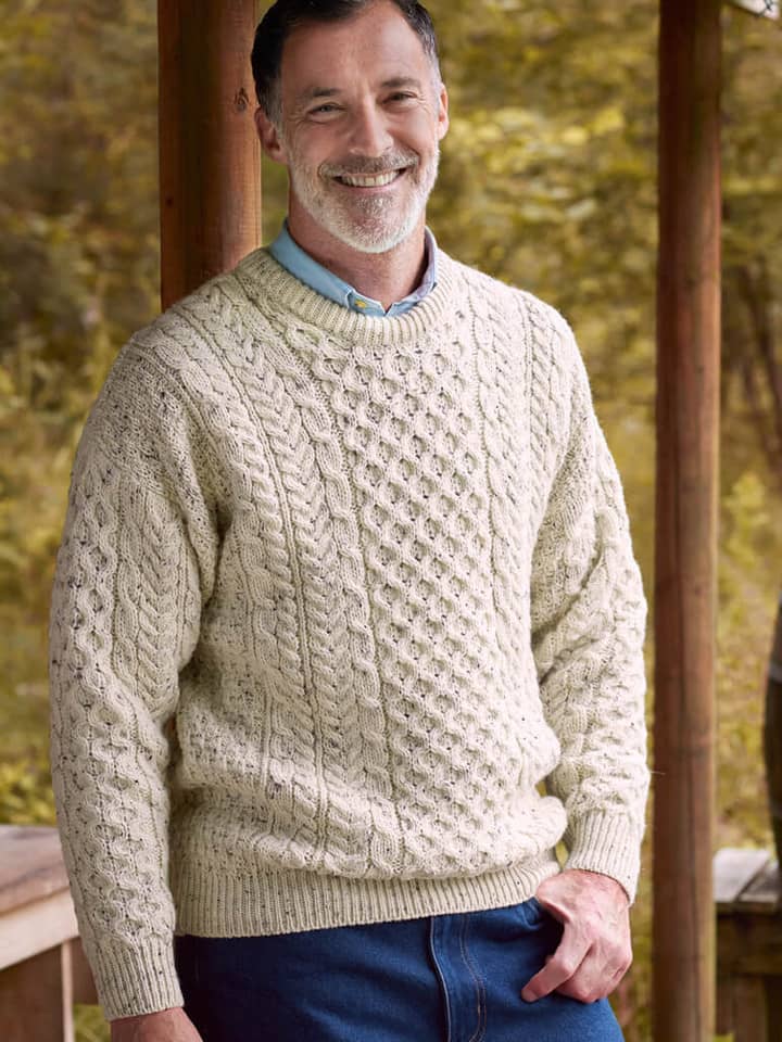 Model wears Oatmeal Traditional Irish Aran Jumper