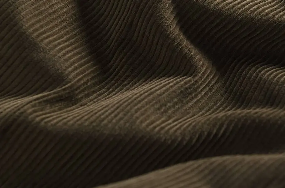 mens-moss-green-corduroy-trousers-fabric-detail.webp